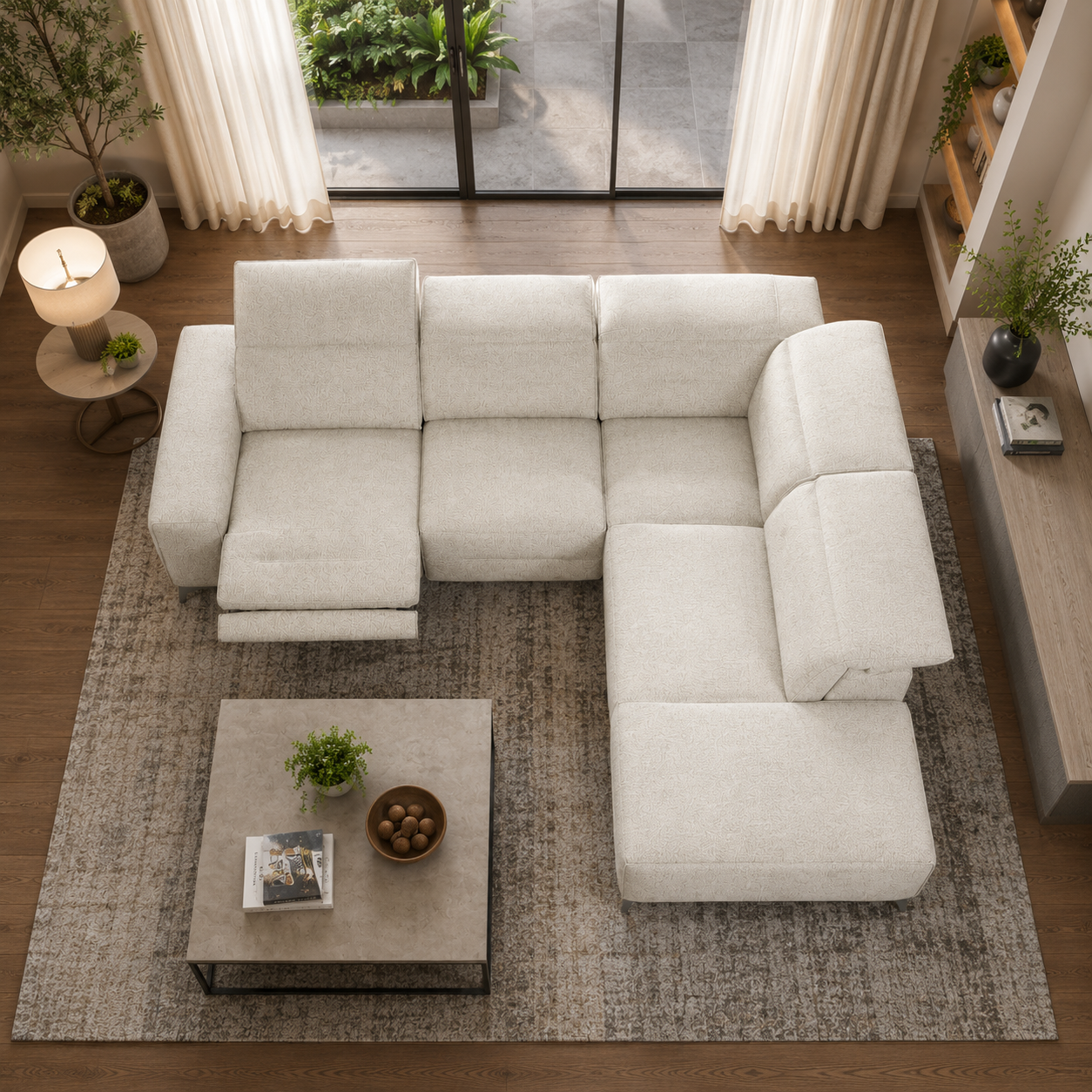 White sectional sofa in a living room with a coffee table and decor items.