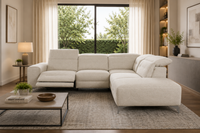 Modern living room with a beige sectional sofa, coffee table, and large windows.